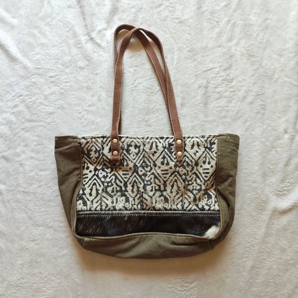 Myra Women's Brown and white boho tote bag with faux cow hide western leather